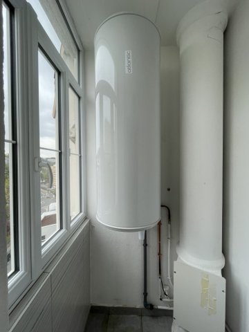 Pose et installation de chauffe-eau Atlantic dans un appartement vers Saint-Genis-Laval 